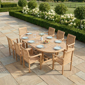 Wooden outdoor dining set on a stone patio with garden in the background