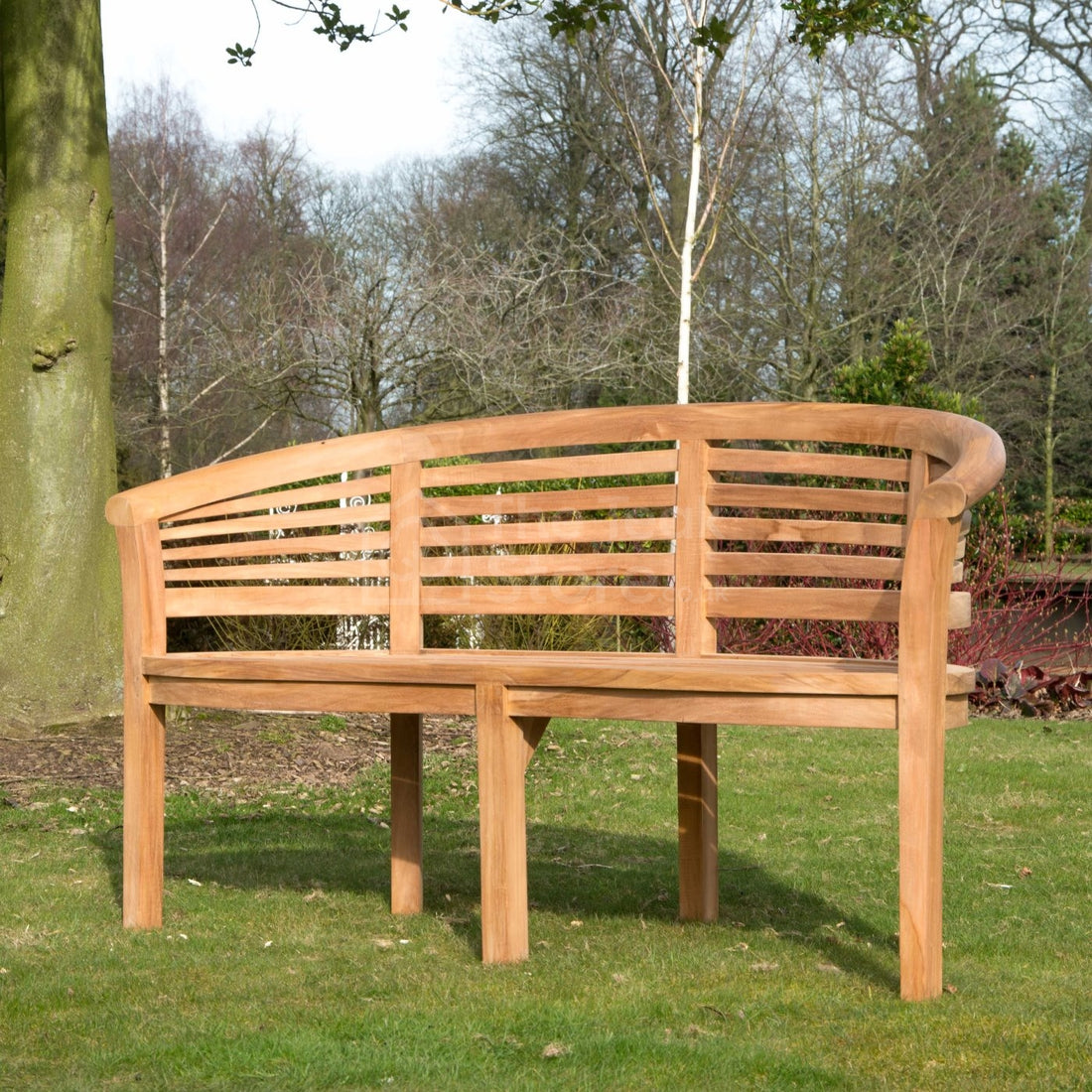 Lewes curved teak banana garden bench measuring 160cm, ideal for outdoor seating.