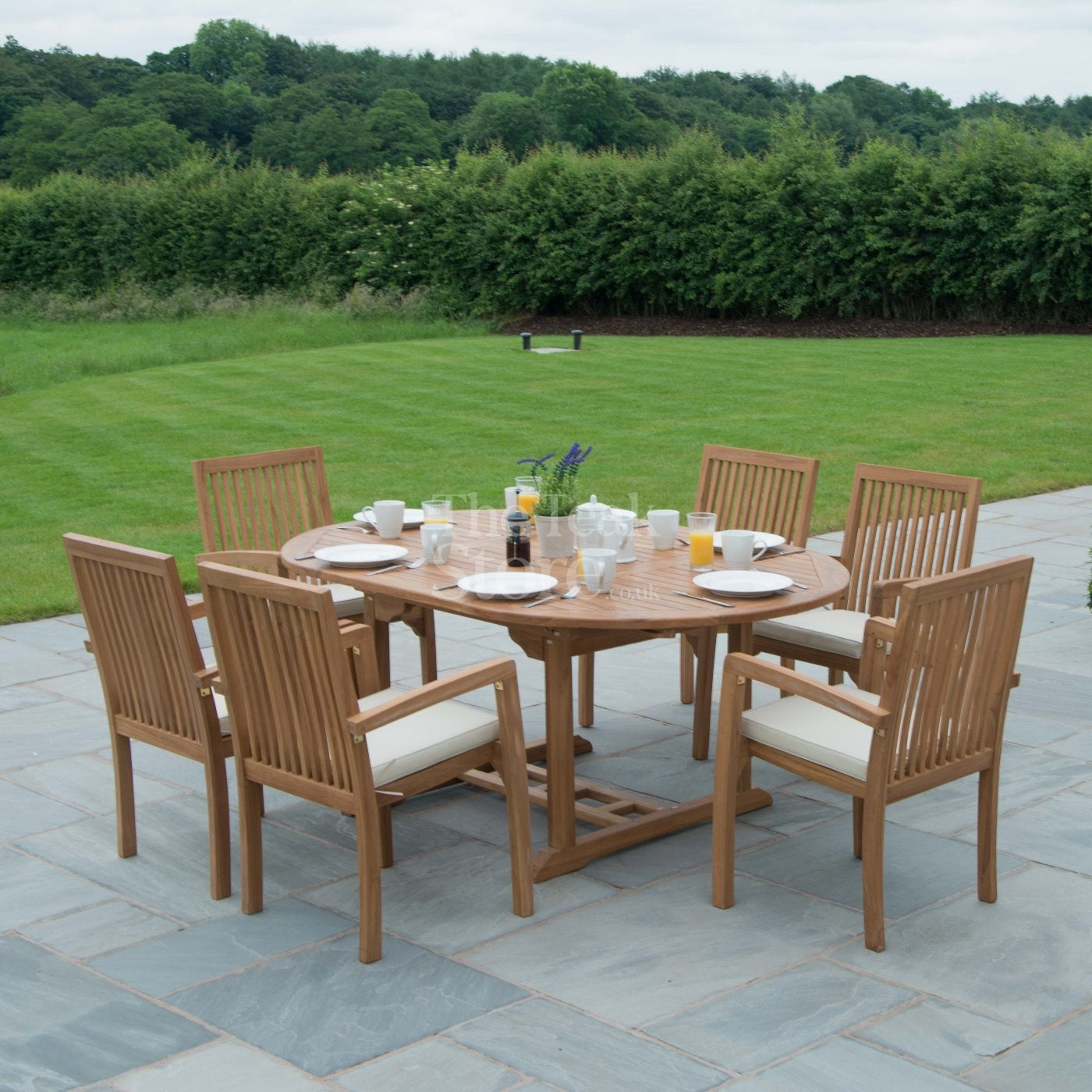 Teak Garden Furniture Dining Set 6 Seat Oval Extending Teak Table &  Winchester Stacking Chairs