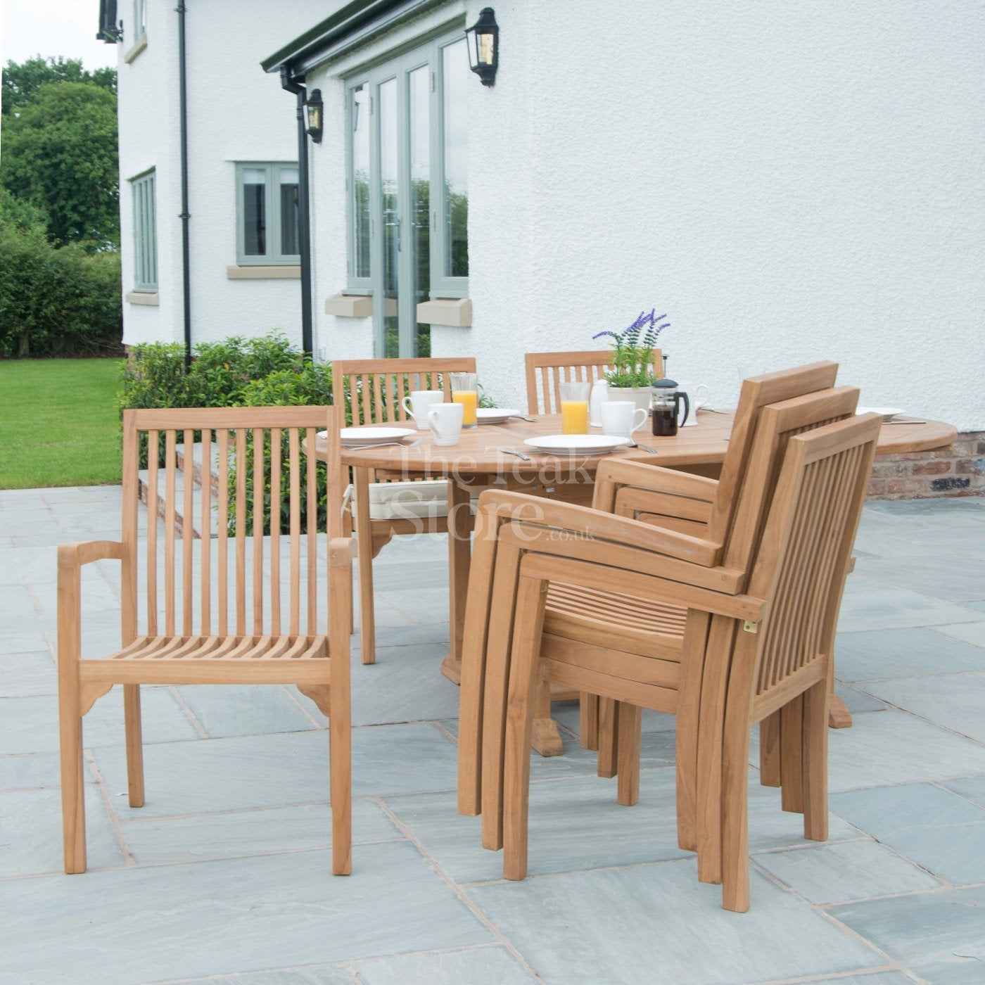 Teak Garden Furniture Dining Set 8 Seat Oval Extending Teak Table &  Winchester Stacking Chairs