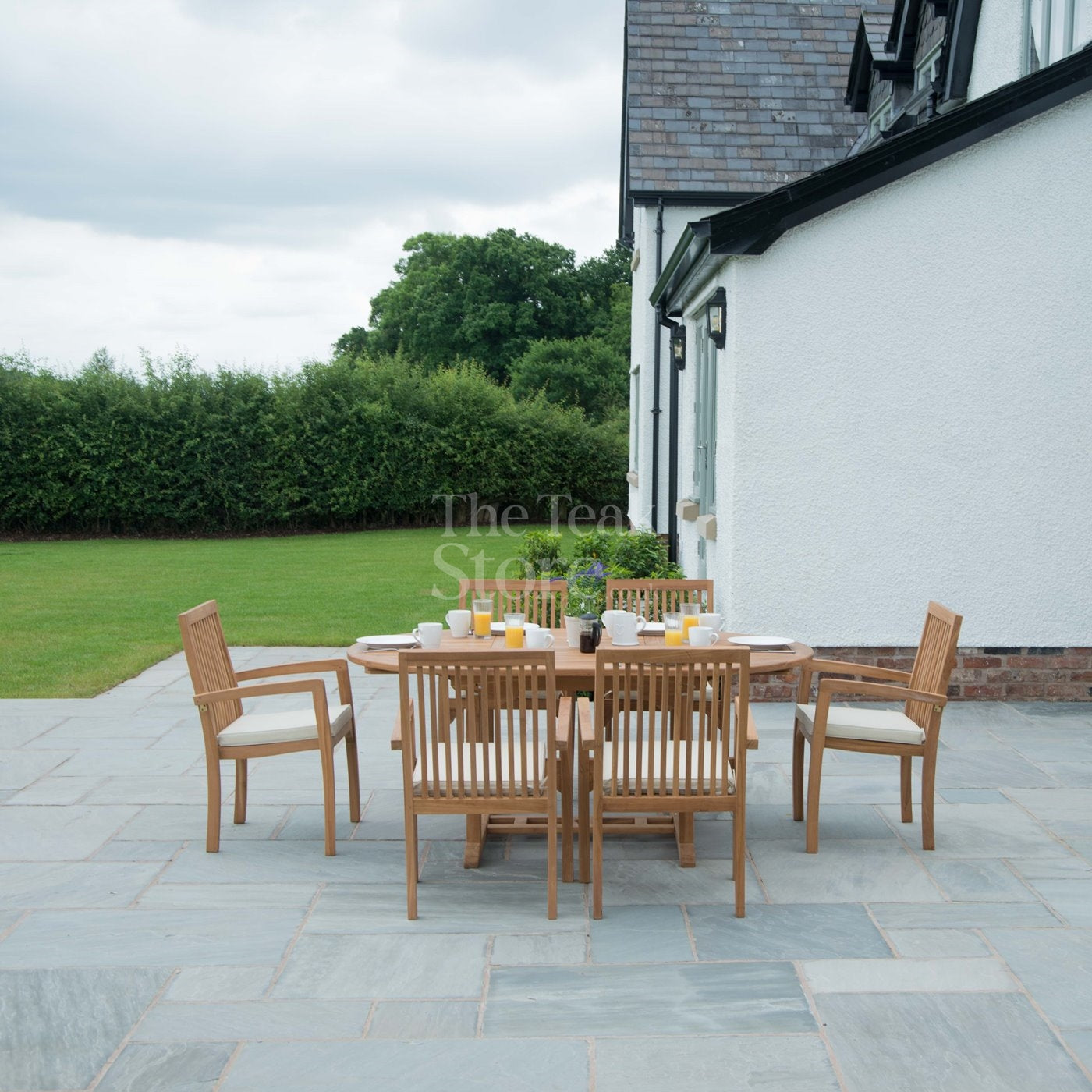 Teak Garden Furniture Dining Set 6 Seat Oval Extending Teak Table &  Winchester Stacking Chairs