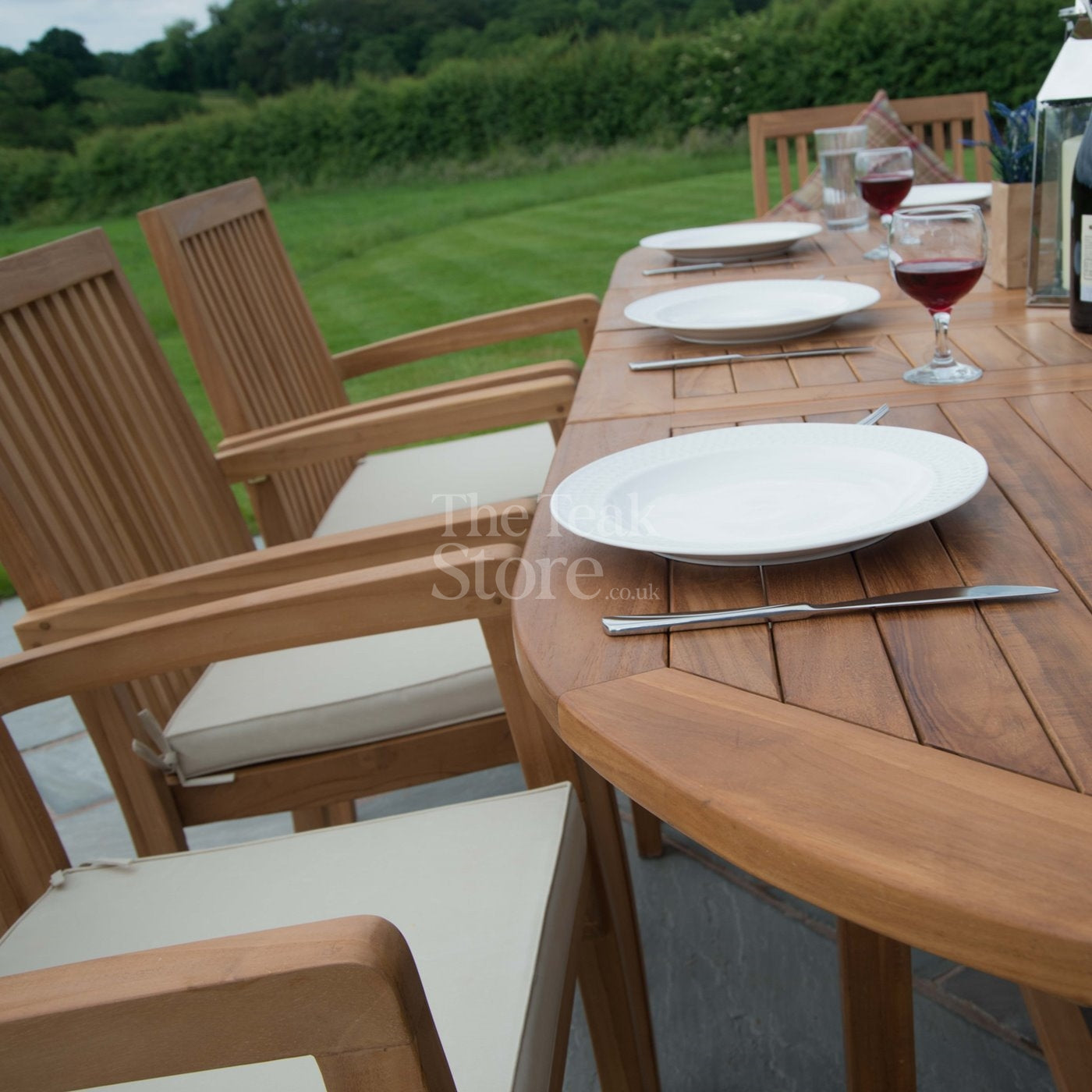 Teak Garden Furniture Dining Set 8 Seat Oval Extending Teak Table &  Winchester Stacking Chairs